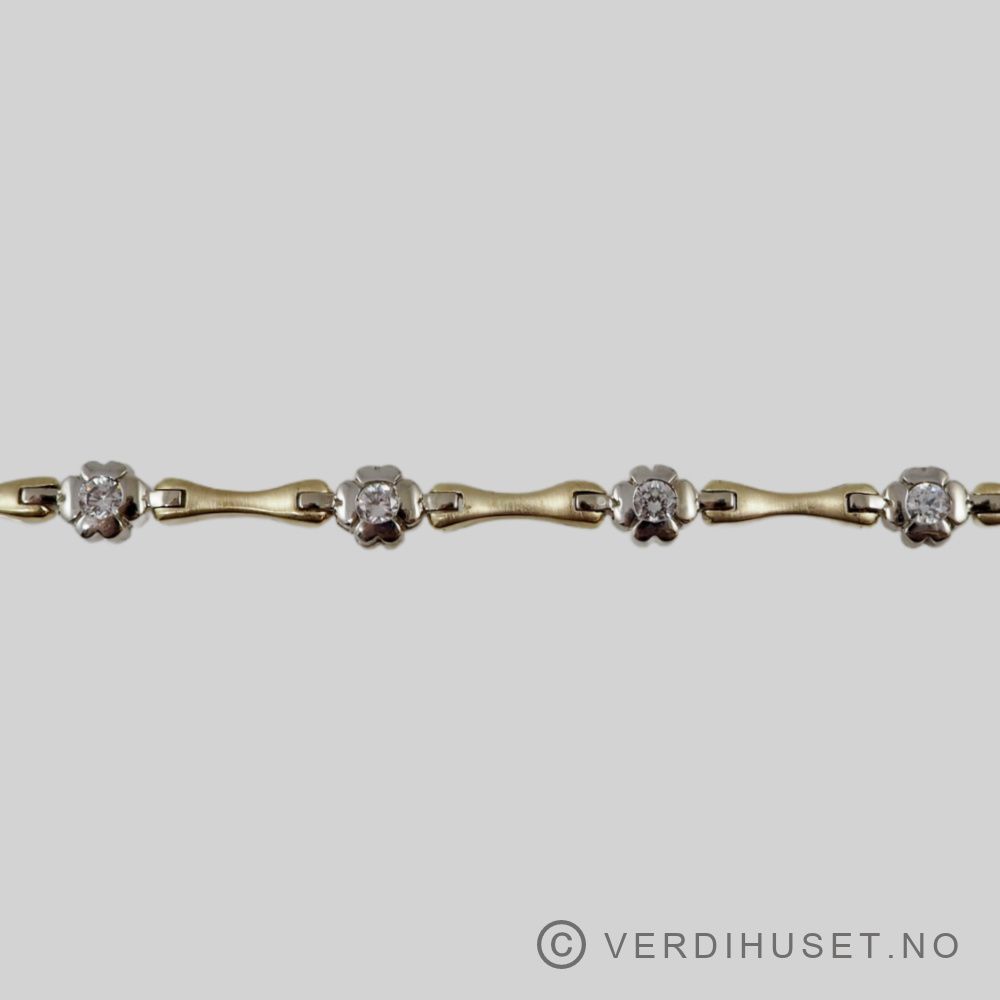 Armbånd i 14 K hvitt og gult gull med blanke stener