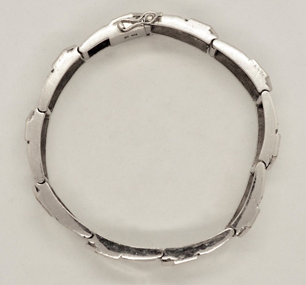 Armbånd i 14 K hvitt gull med 10 diamanter