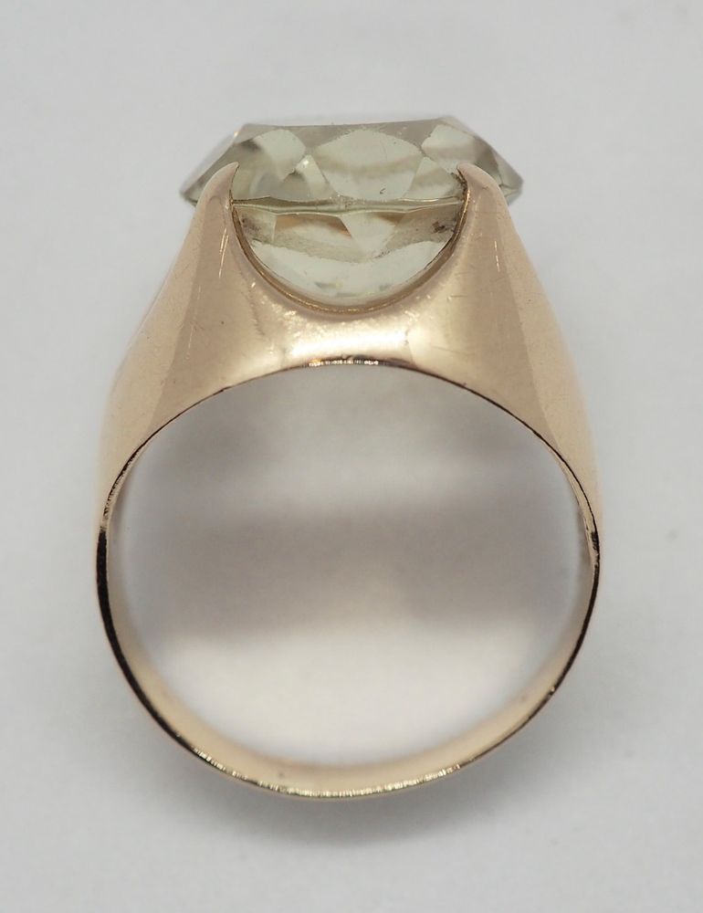 Ring i 14 K gull med blank/champagne-farget sten