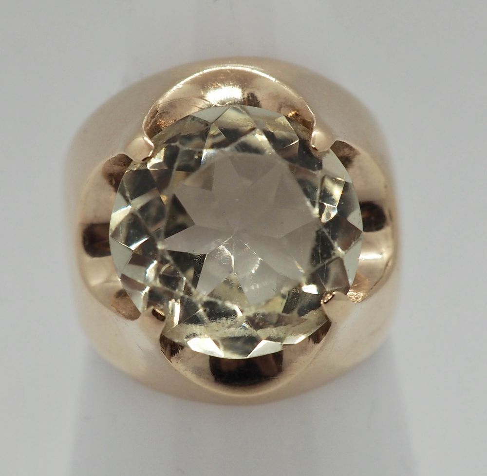 Ring i 14 K gull med blank/champagne-farget sten