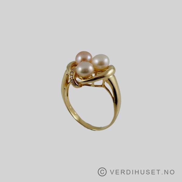 Hovedbilde Ring i 18 K gull med 3 perler og blanke stener