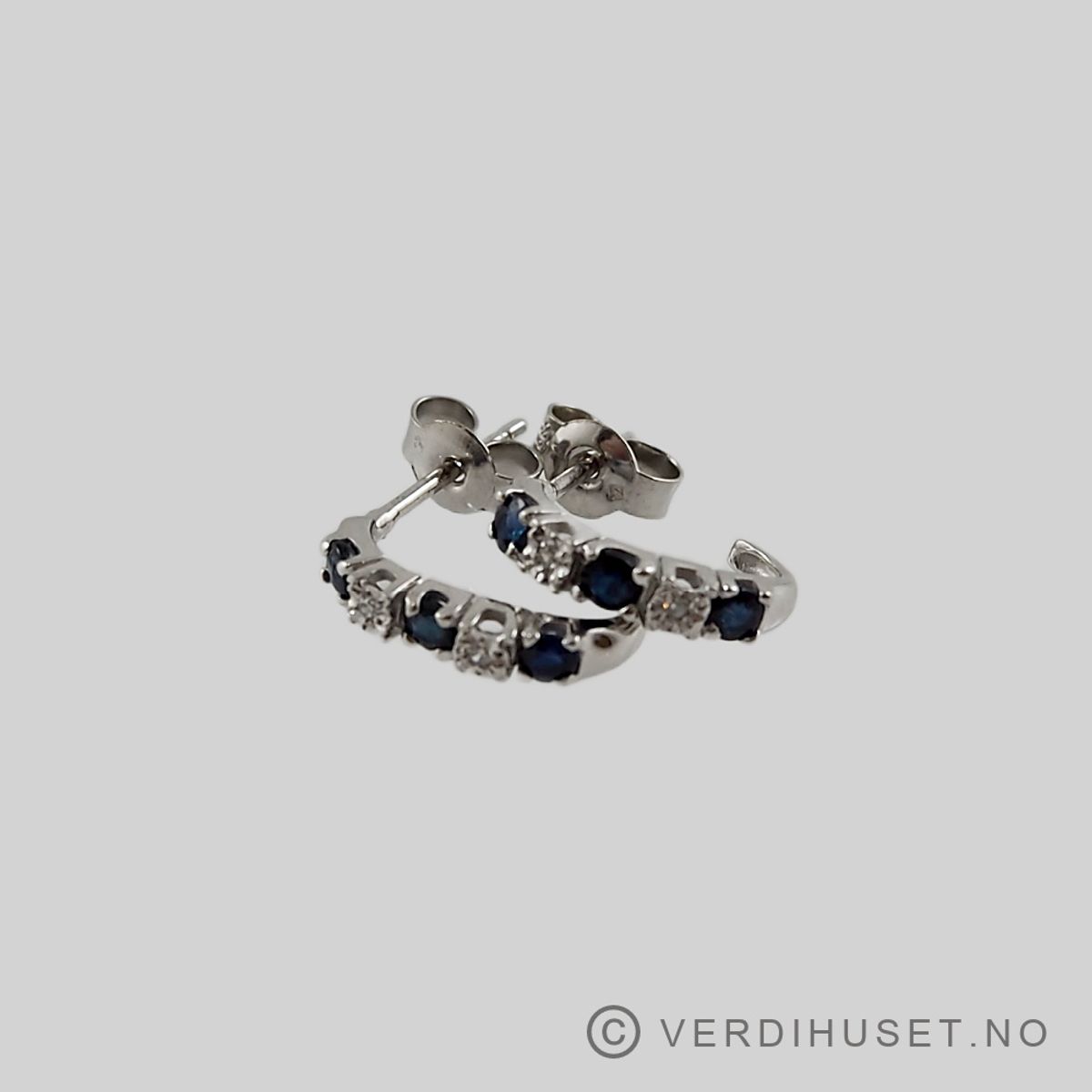 Ørepynt i 14 K hvitt gull med blå og blanke stener